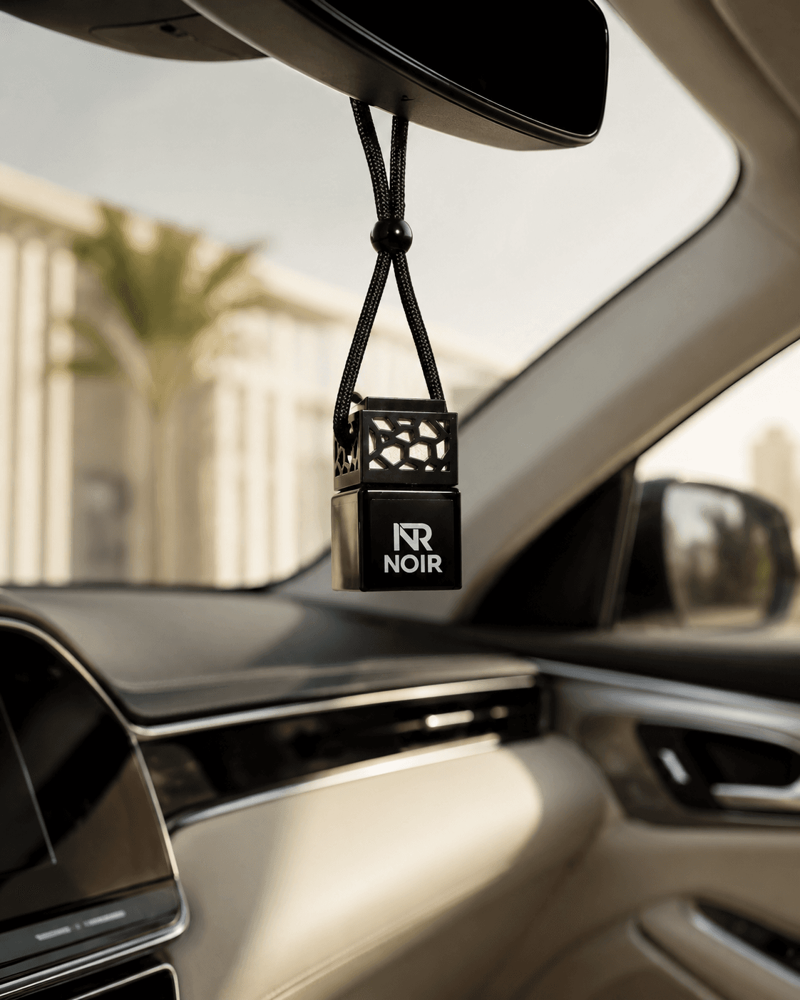 Noir Moris hanging in a car cabin